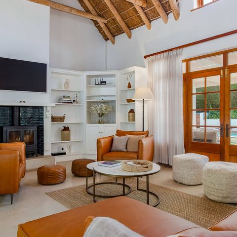 Living room with Samsung Frame TV and wood-burning stove