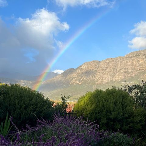 Rainbow over the mountains from the garden