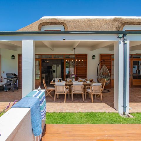 Covered veranda seen from the pool deck